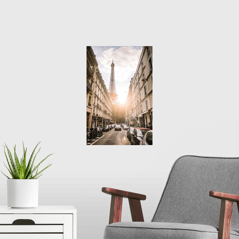 A modern room featuring Photograph of a streetscape in Paris with the sun beaming through the Eiffel Tower in the backgro...