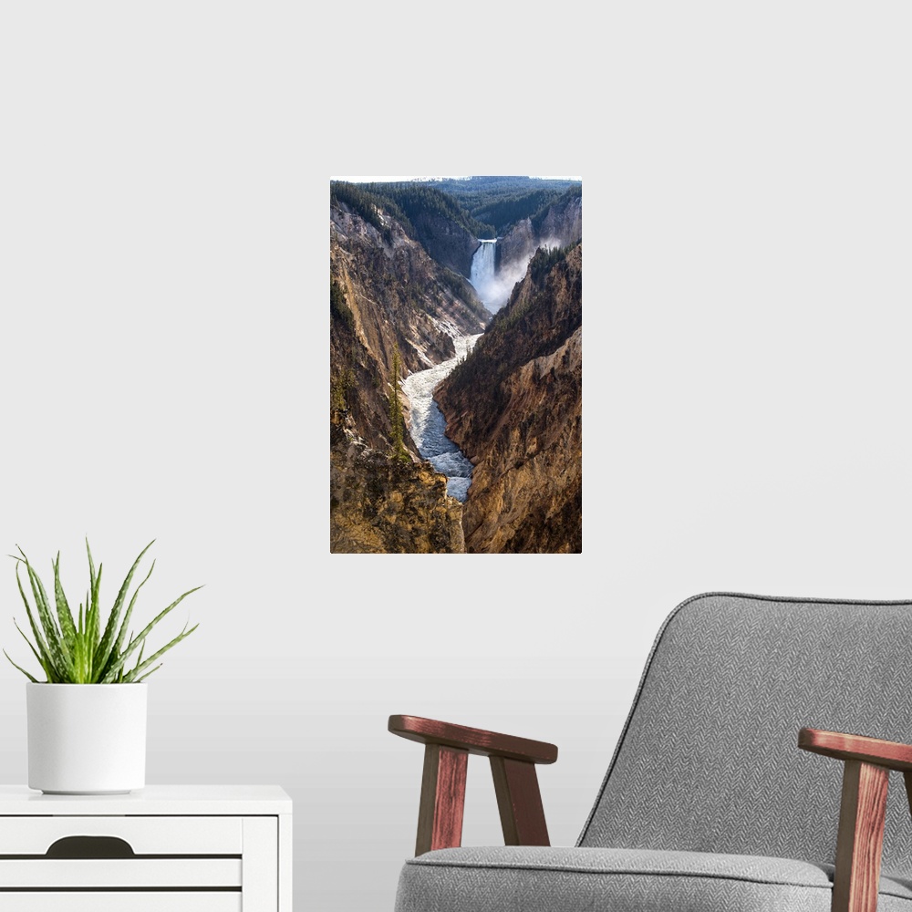 A modern room featuring View of Winding Yellowstone River with Lower Falls in the background at Yellowstone National Park...
