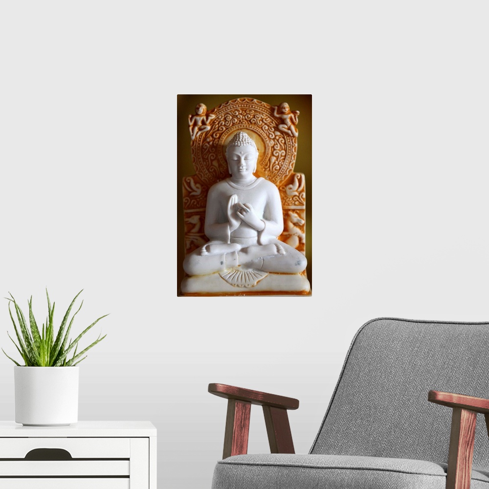 A modern room featuring Buddha statue, Paris, France, Europe
