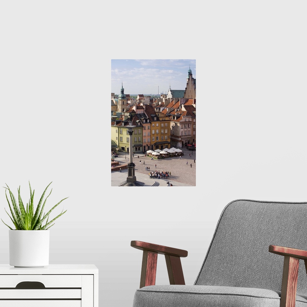 A modern room featuring Castle Square and colourful houses of the Old Town, Warsaw, Poland