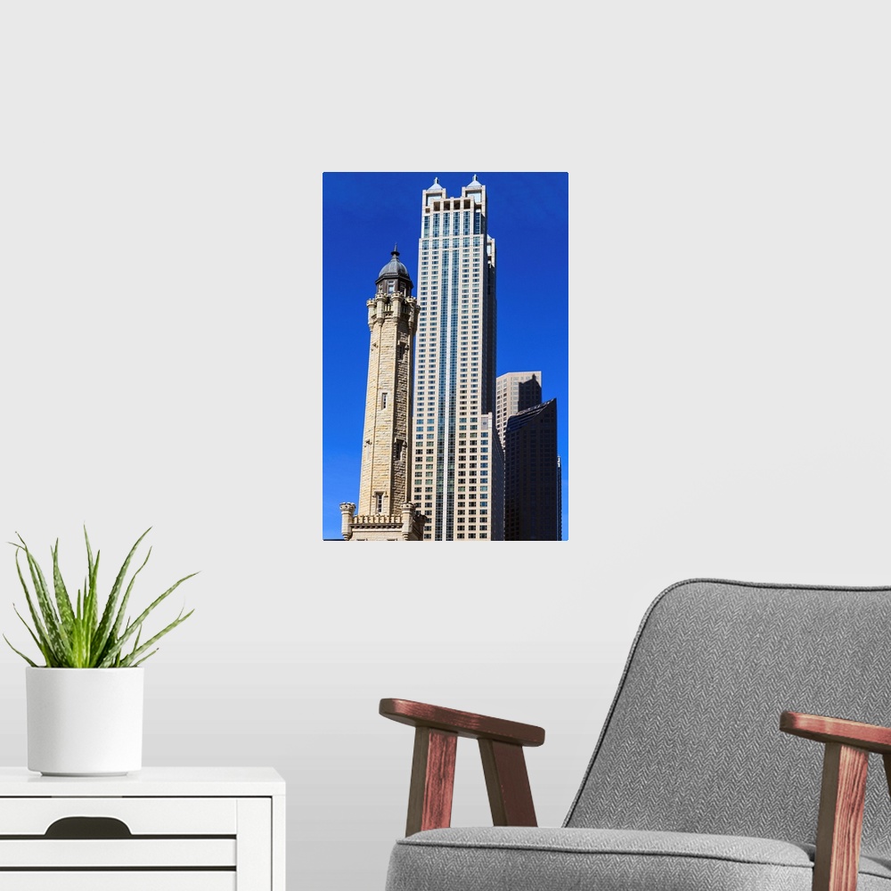 A modern room featuring Chicago Water Tower, behind is 900 North Michigan, Chicago, Illinois, USA