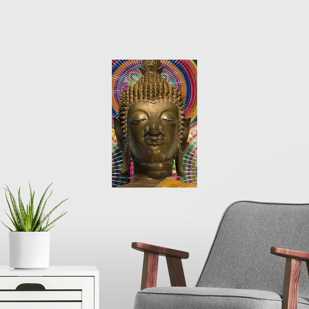 A modern room featuring Head of a statue of the Buddha, Wat Ong Teu, Vientiane, Laos, Indochina, Southeast Asia