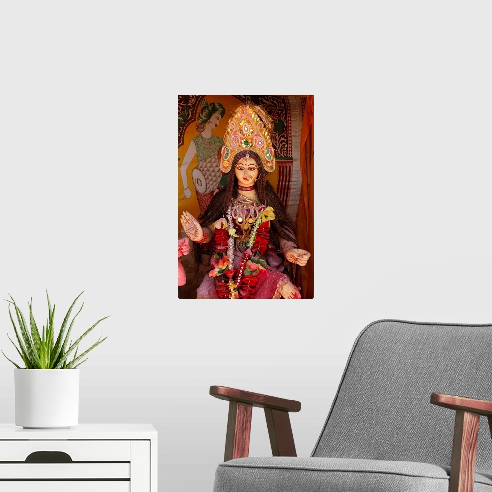 A modern room featuring Hindu goddess, Goverdan, Uttar Pradesh, India, Asia.
