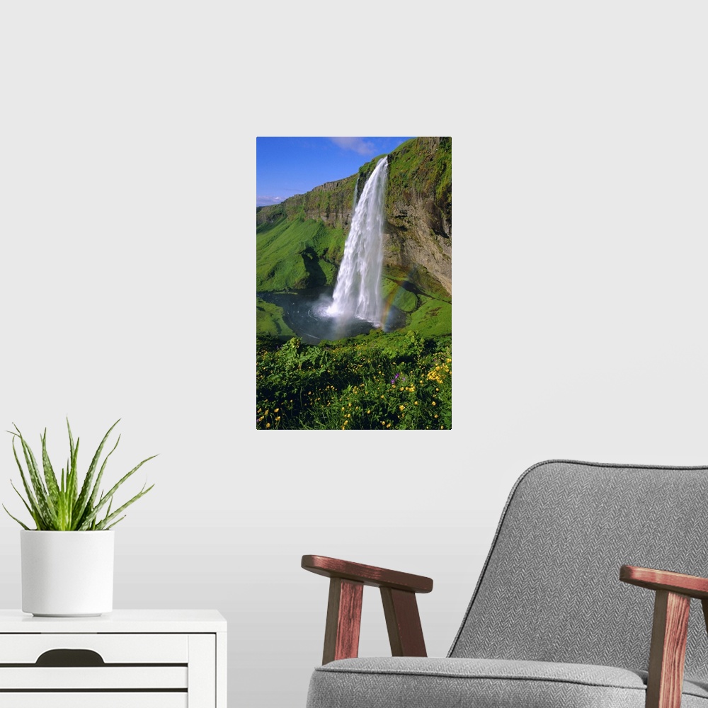 A modern room featuring Seljalandsfoss waterfall in the south of the island, Iceland