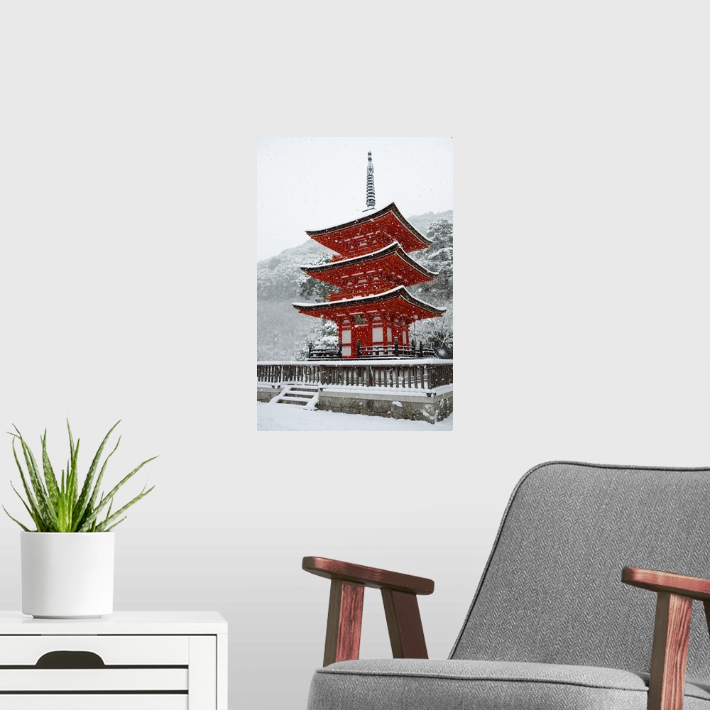 A modern room featuring Snow falling on small red pagoda, Kiyomizu-dera Temple, Kyoto, Japan