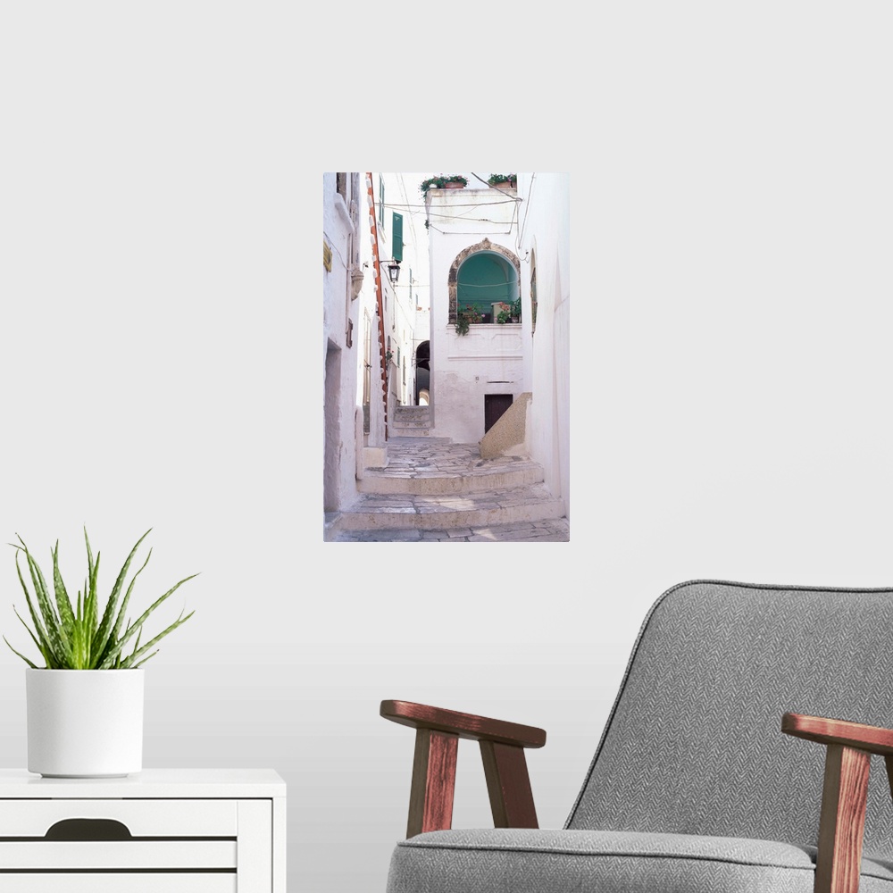 A modern room featuring Typical street, Ostuni, Puglia, Italy