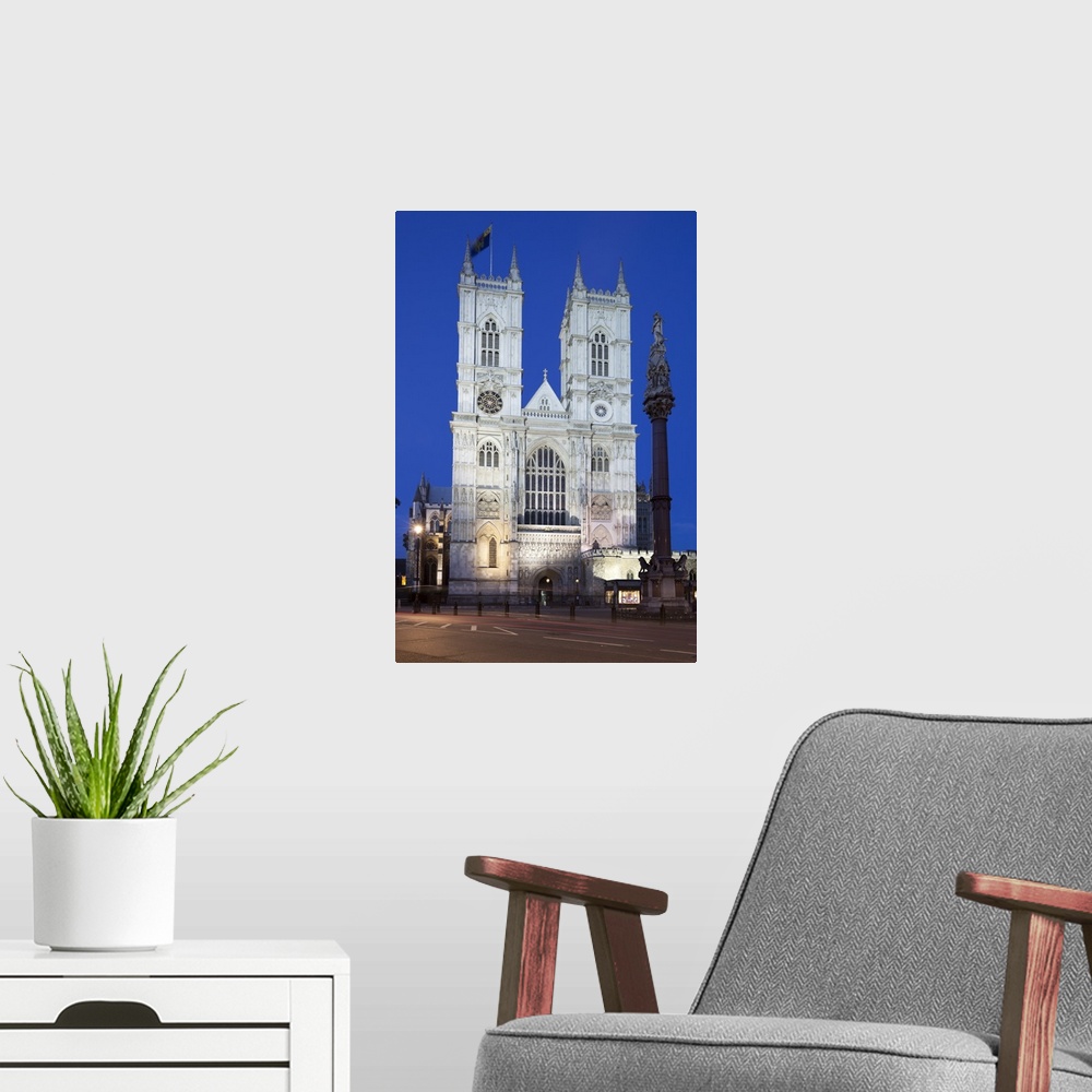 A modern room featuring Westminster Abbey at night, Westminster, London, England, United Kingdom, Europe.