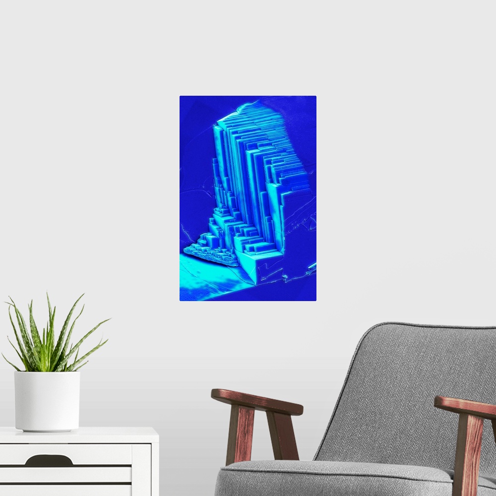 A modern room featuring Sapphire. Coloured scanning electron micrograph of a fractures sapphire. Sapphire is aluminium ox...