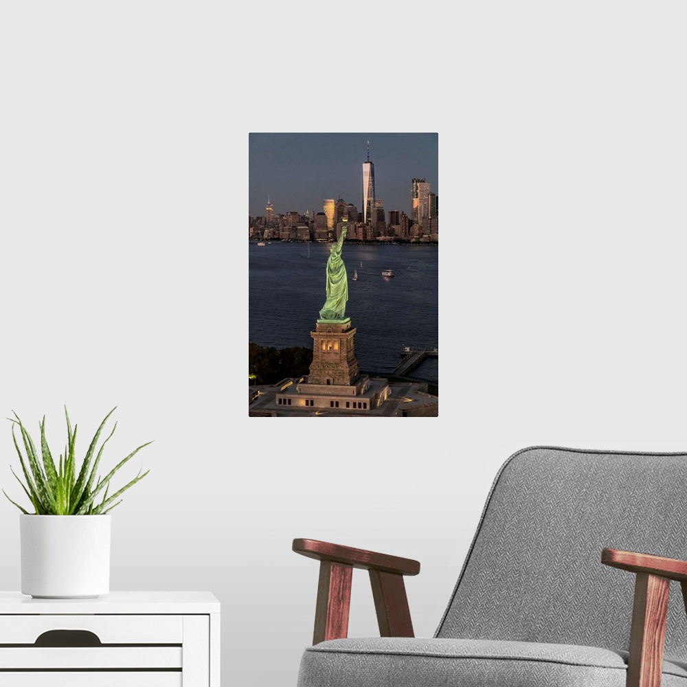 A modern room featuring Aerial view of Stature of Liberty and New York City from above
