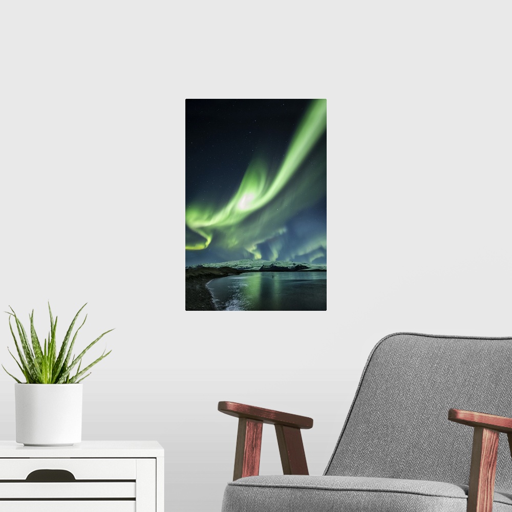 A modern room featuring Aurora Borealis above Jokulsarlon Lagoon in Iceland.