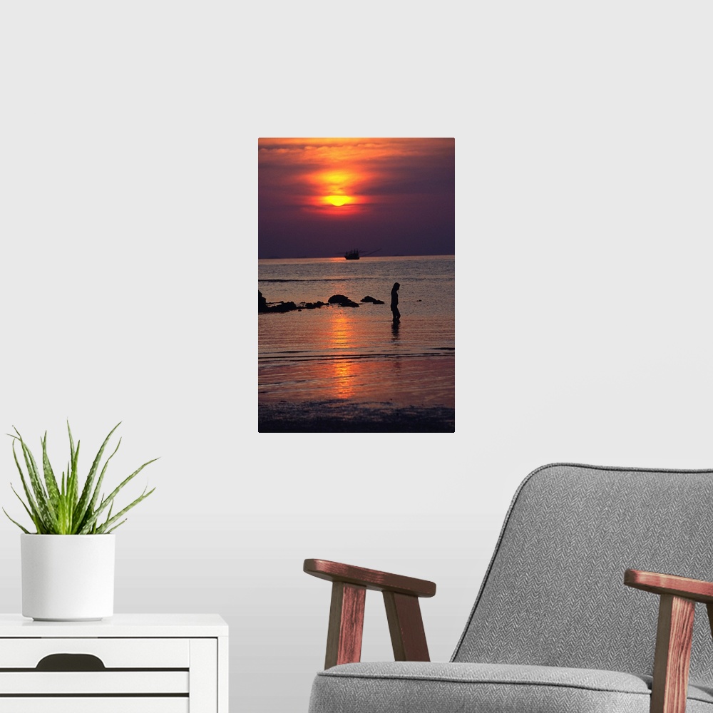 A modern room featuring Woman walking on beach at sunset, Koh Samui, Thailand