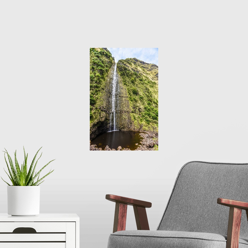 A modern room featuring Big Island Hawaii. A waterfall on the big island's inaccessible northeast shore.