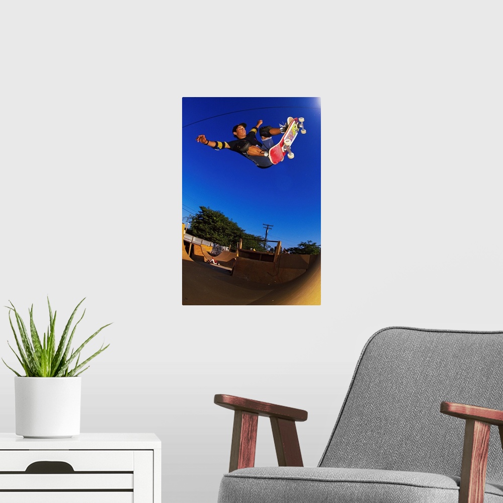 A modern room featuring Vintage photo of Omar Hassan ripping in SoCal, 1989. Photo may have a film grain texture. Locatio...