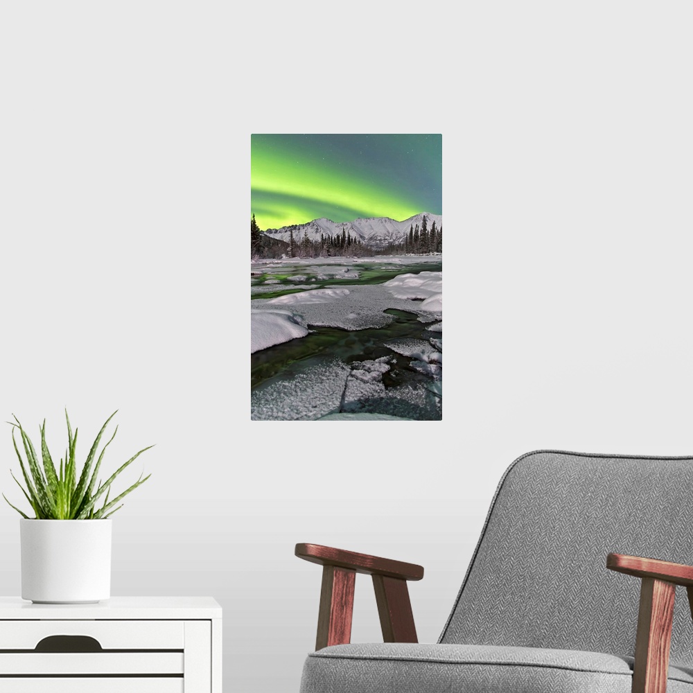 A modern room featuring Aurora borealis over Annie Lake, Yukon, Canada.