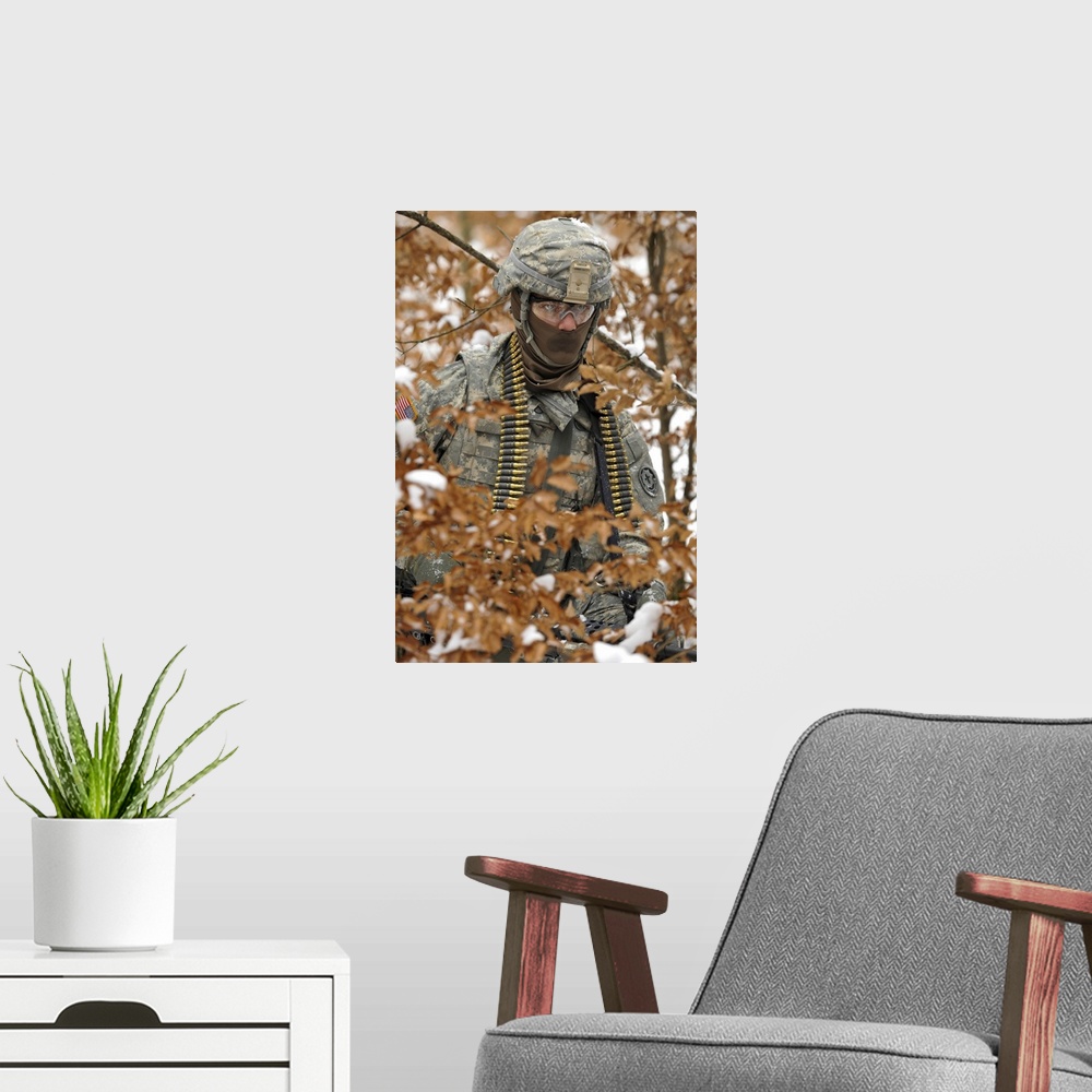 A modern room featuring February 12, 2013 - U.S. Army soldier conducts a dismounted patrol during a squad level training ...