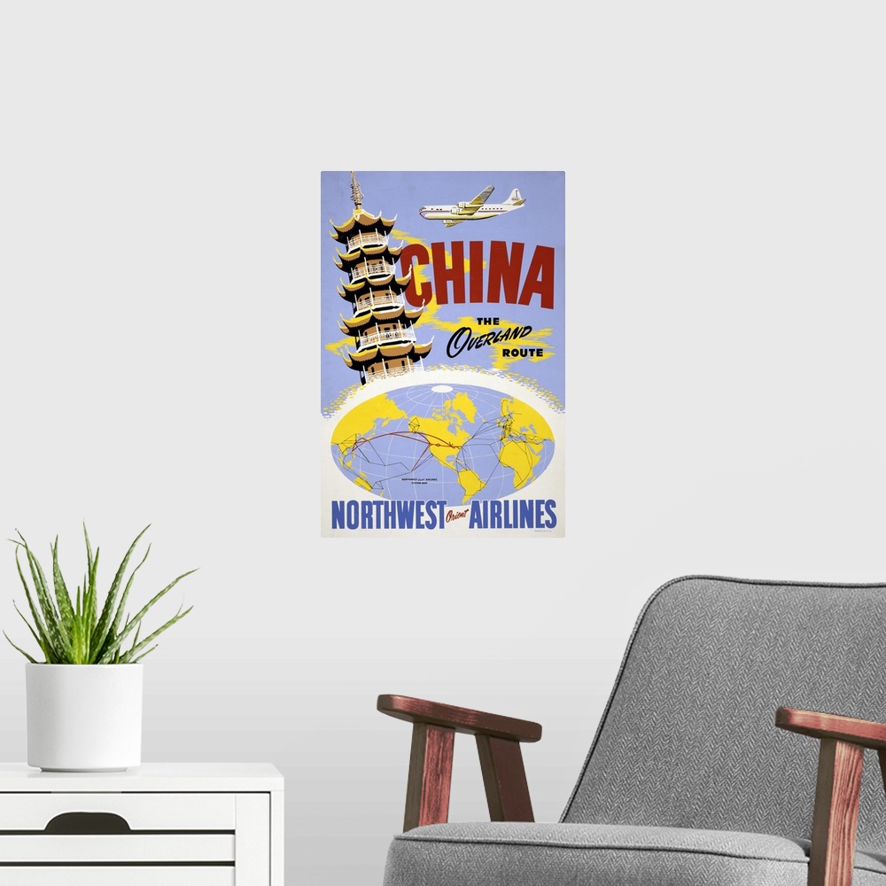 A modern room featuring Vintage travel poster of a pagoda and an airplane, above a Northwest Orient Airlines system map, ...