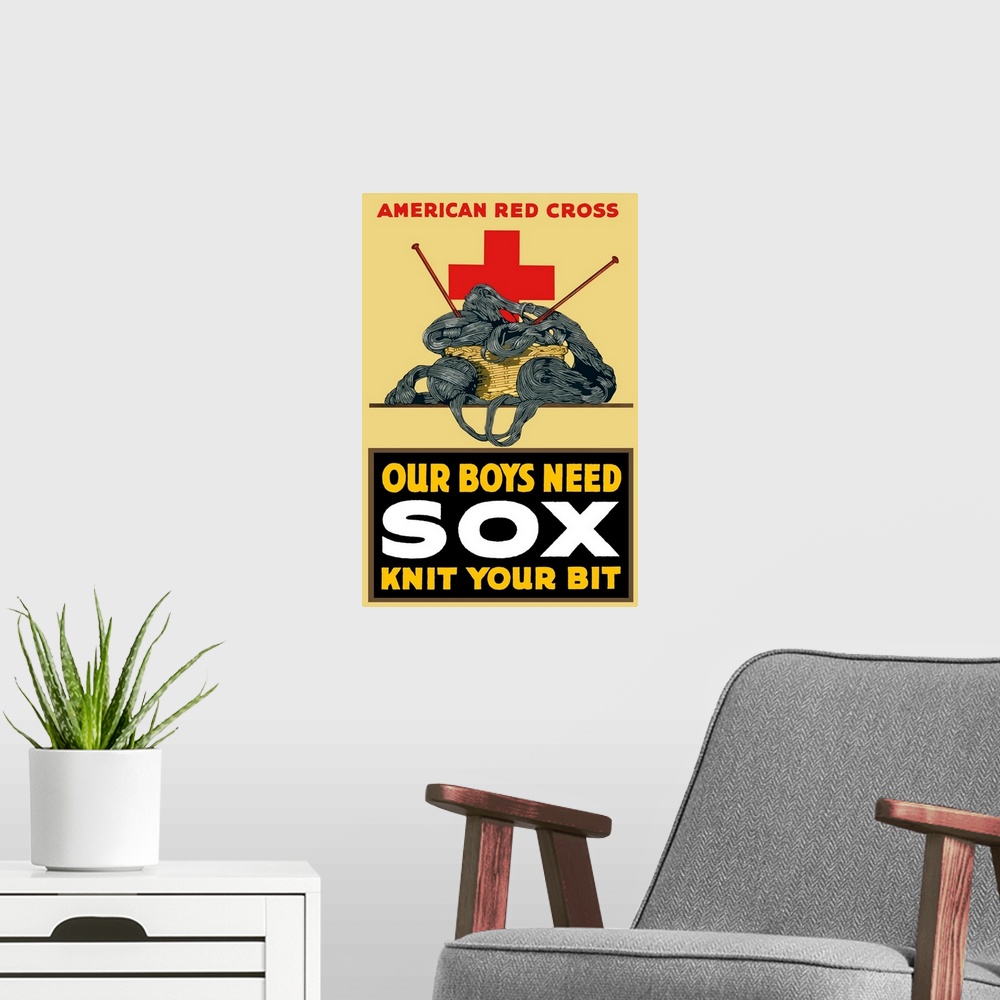 A modern room featuring Vintage World War One poster of a basket of yarn, two knitting needles, and a large red cross. It...