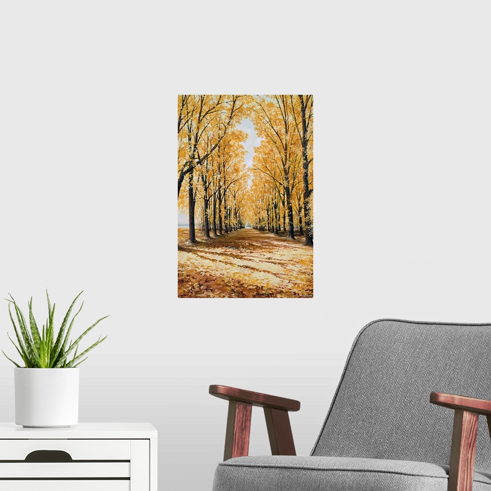 A modern room featuring Large print of a path lined with brightly colored fall trees.