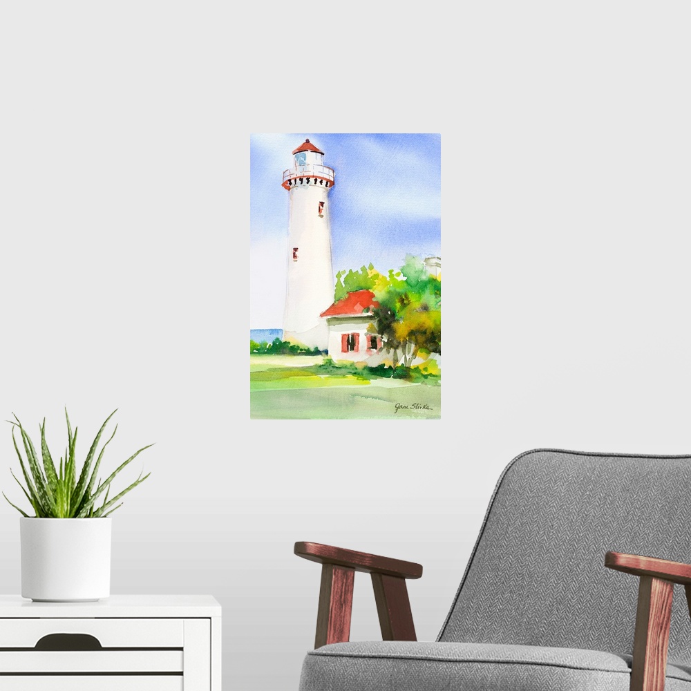 A modern room featuring Contemporary painting of a white lighthouse near green trees.