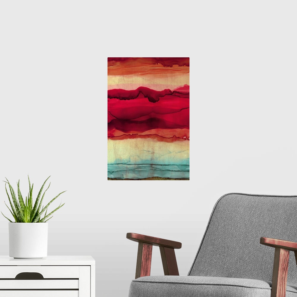 A modern room featuring Abstract painting with orange, pink, red, and blue hues layered together to resemble mountains.