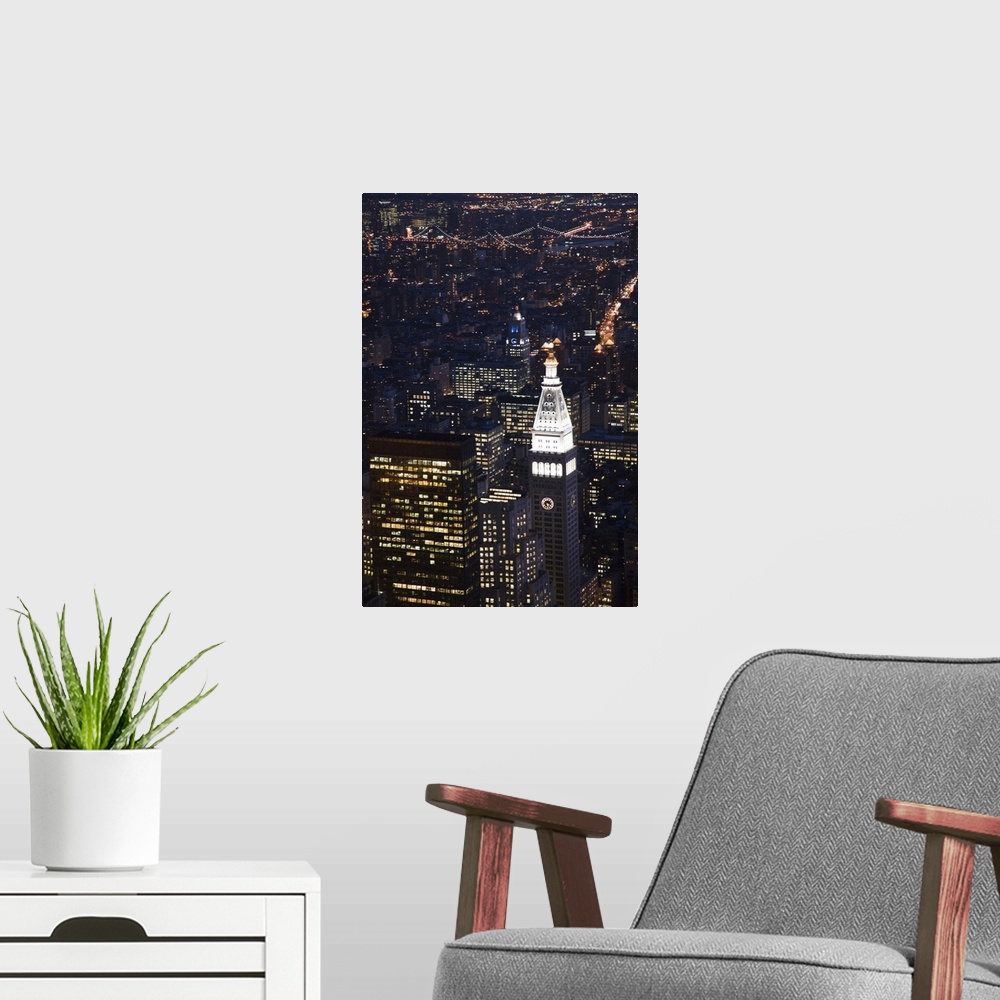 A modern room featuring Nocturnal view of Midtown and Downtown Manhattan from the Empire State Building, NYC, USA