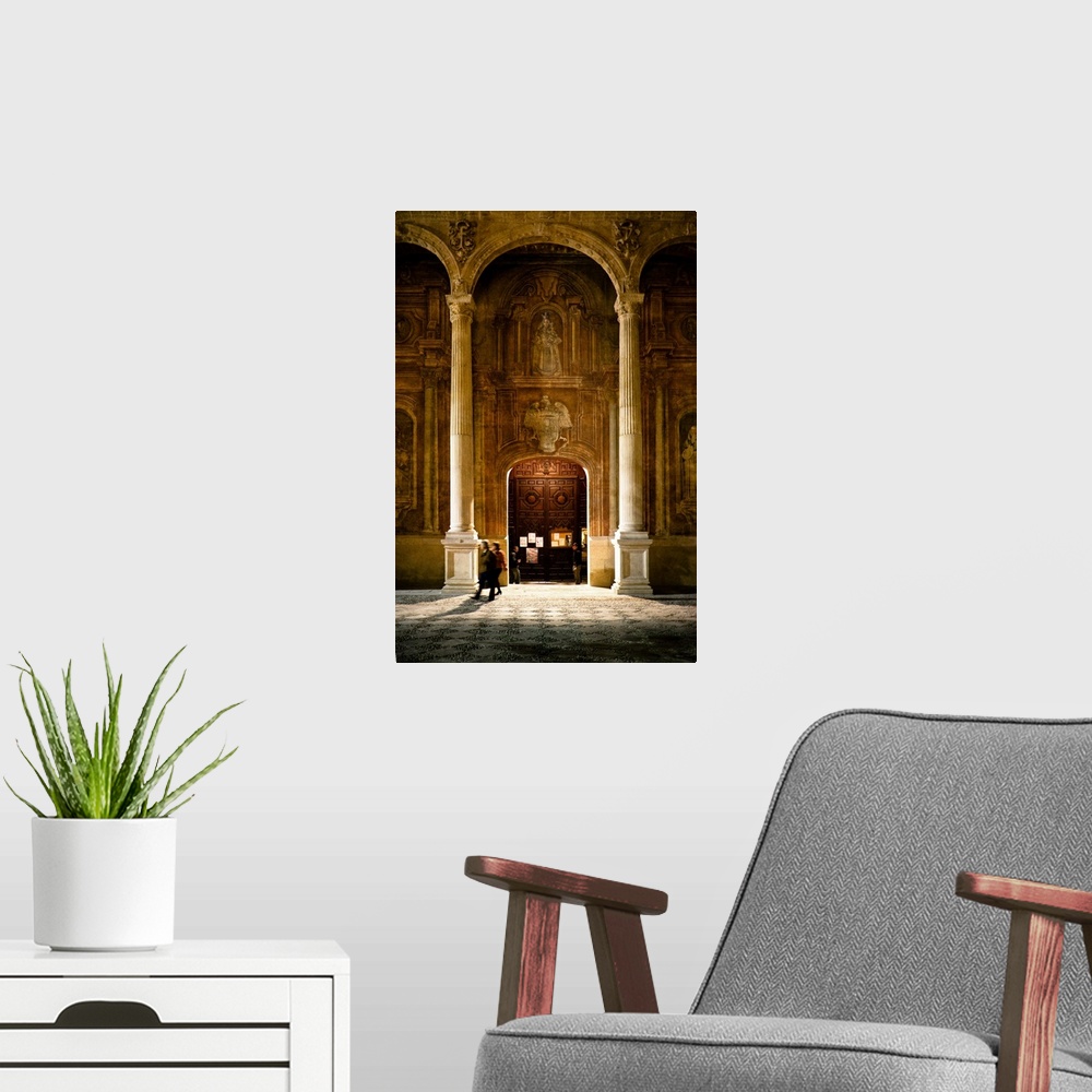 A modern room featuring Some people at the entrance of the Santo Domingo Church in Granada, Spain