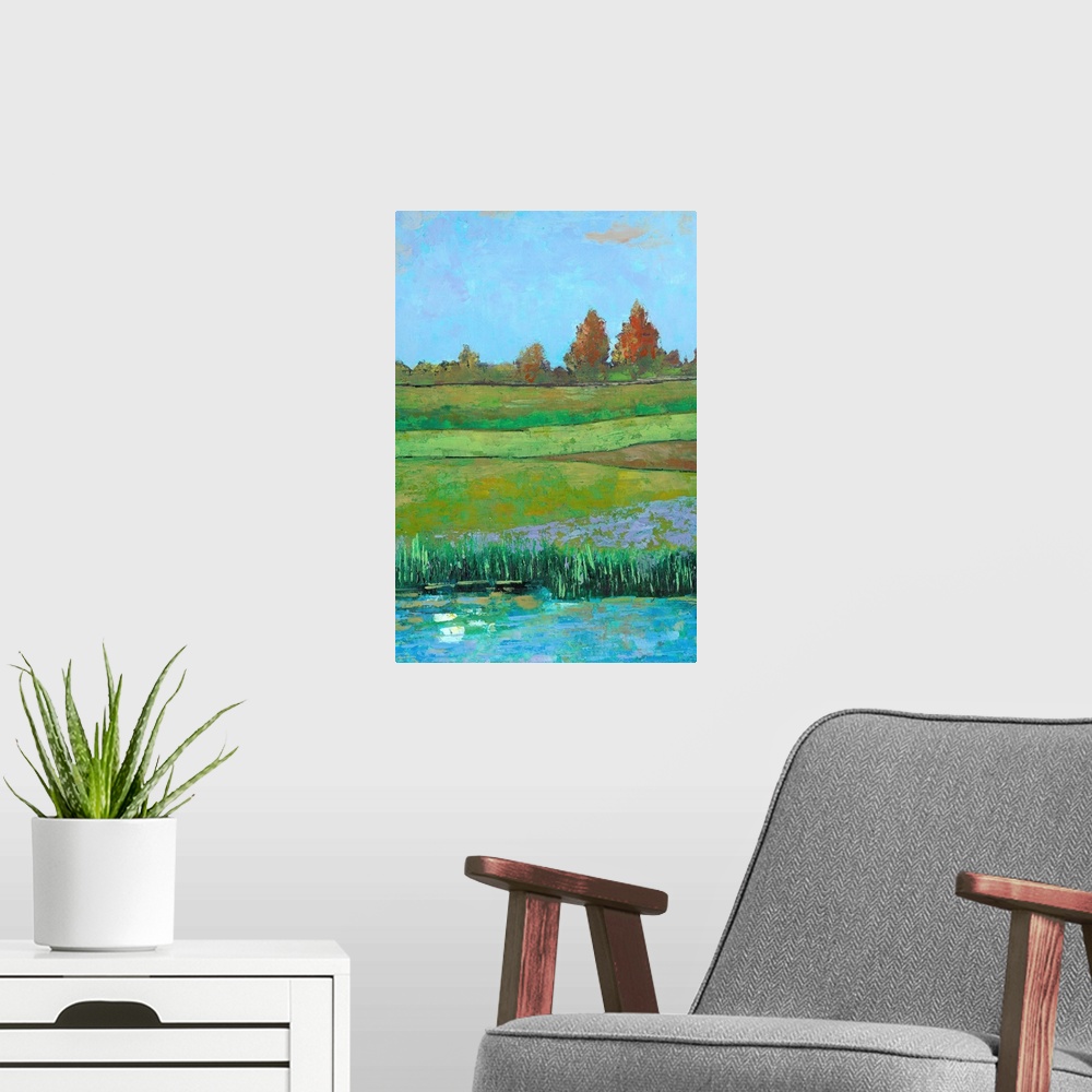 A modern room featuring Contemporary painting of a countryside landscape with green fields.