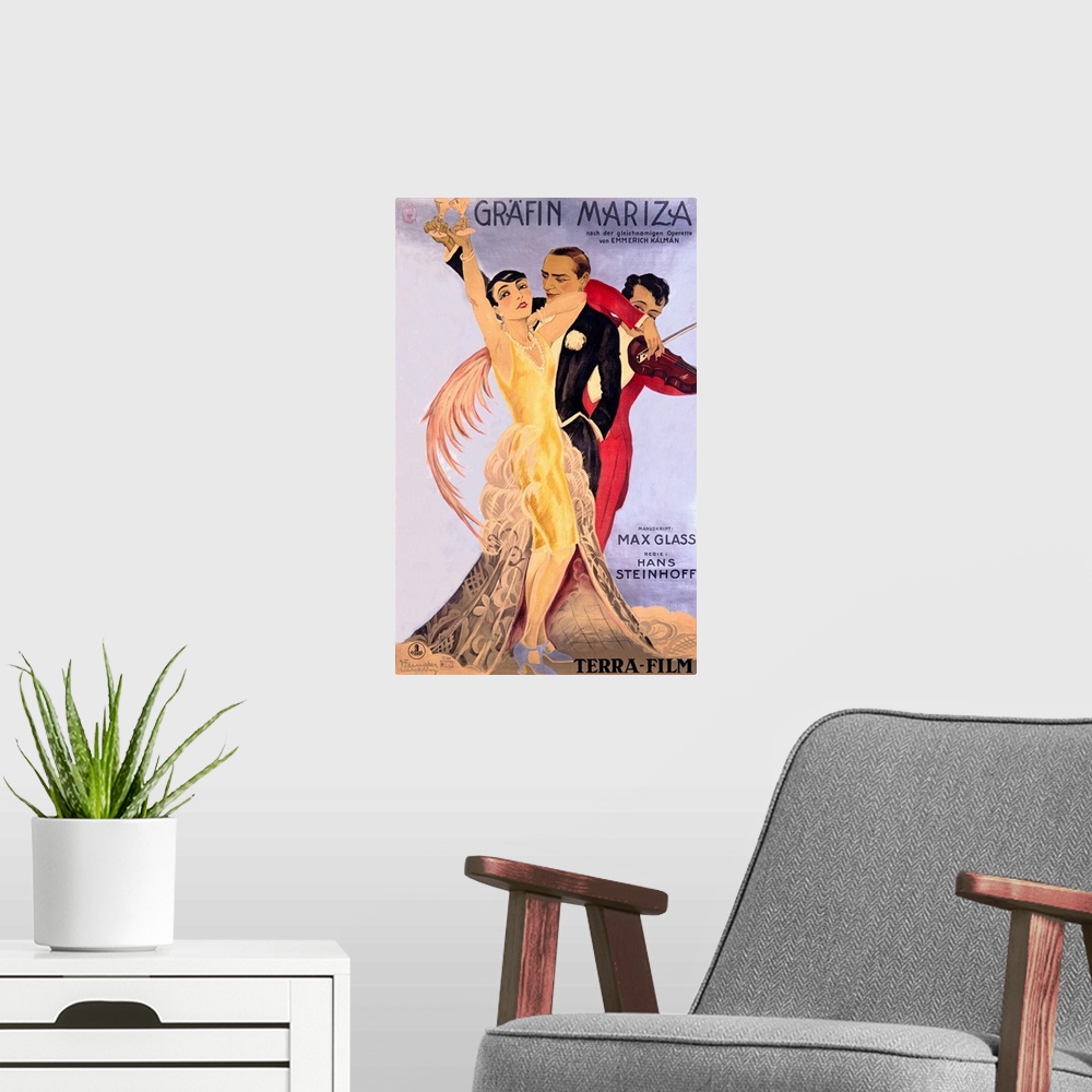A modern room featuring Old entertainment advertising print.  A man and woman dressed in vintage formal wear are holding ...
