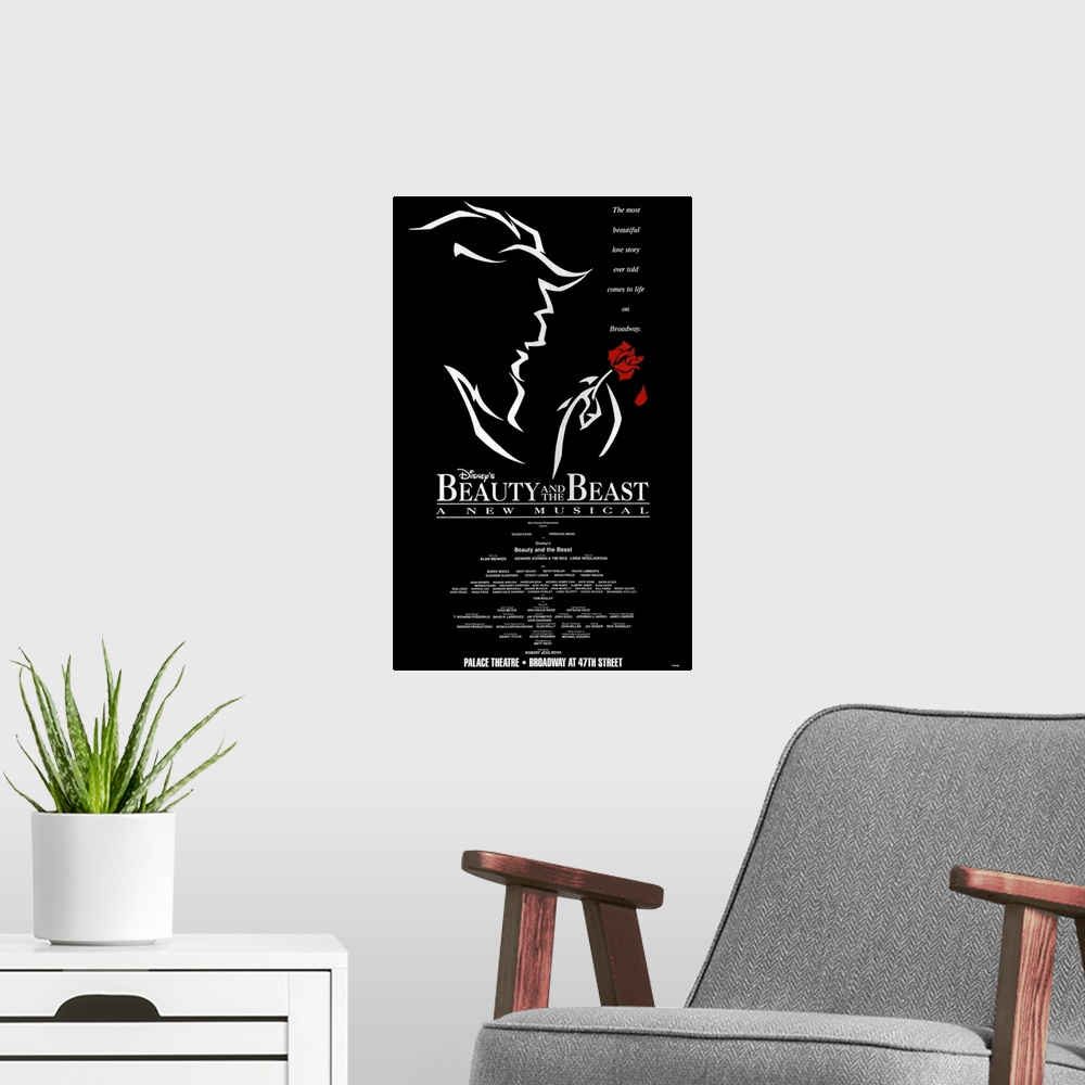 A modern room featuring A simplistic poster for the Broadway performance of "Beauty and the Beast". It shows an outline o...