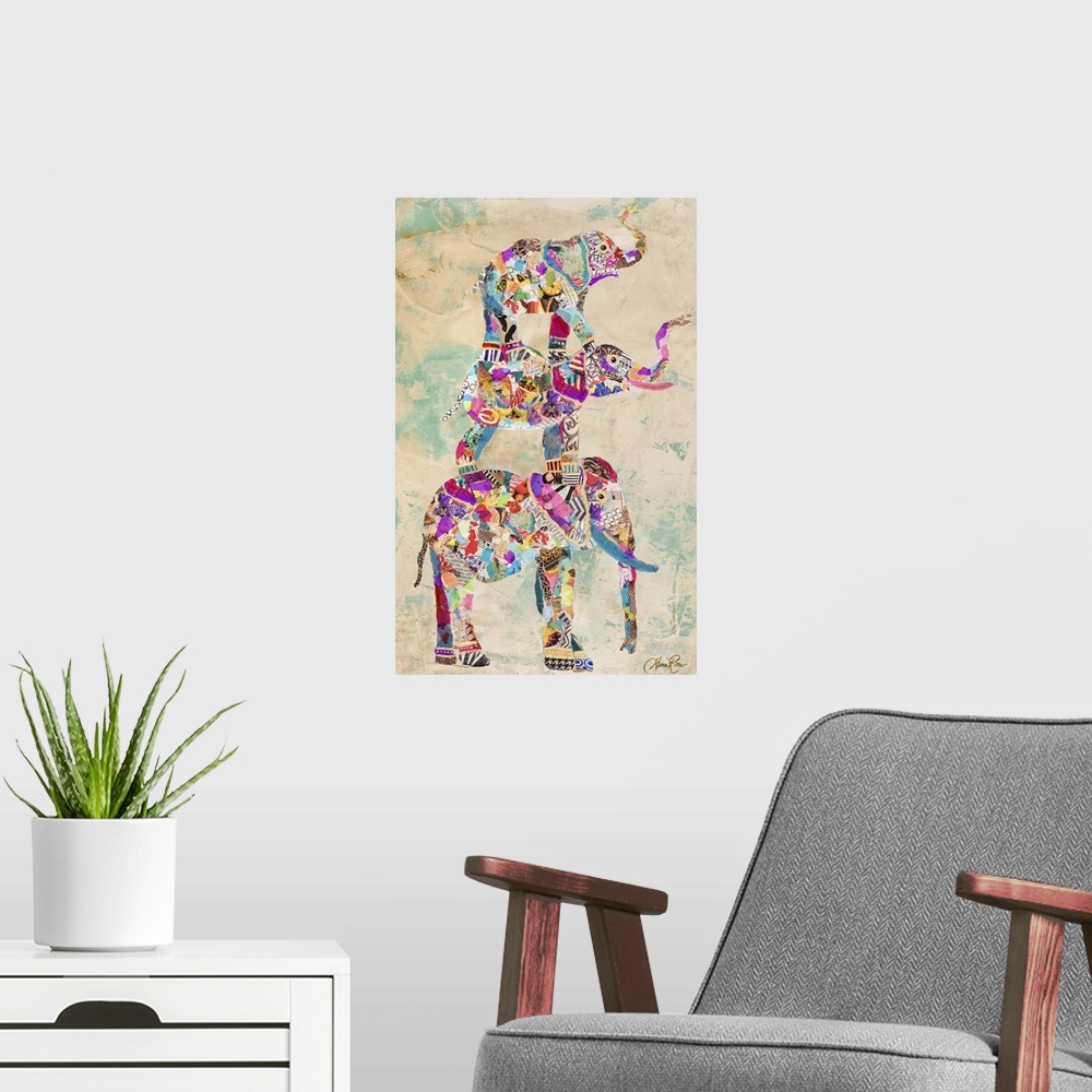 A modern room featuring Painting of three colorful different sized elephants standing on top of each other.
