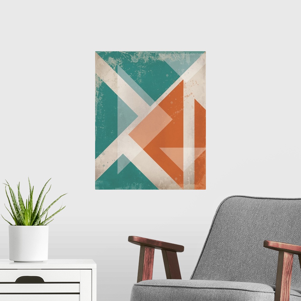 A modern room featuring Contemporary artwork of retro stylized triangles in warm and cool tones over a neutral background.