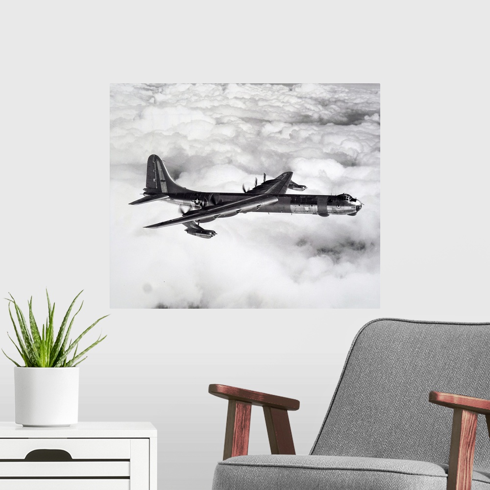 A modern room featuring Photograph of a Convair B36 Peacemaker. The Convair B36 Peacemaker was a strategic bomber plane b...