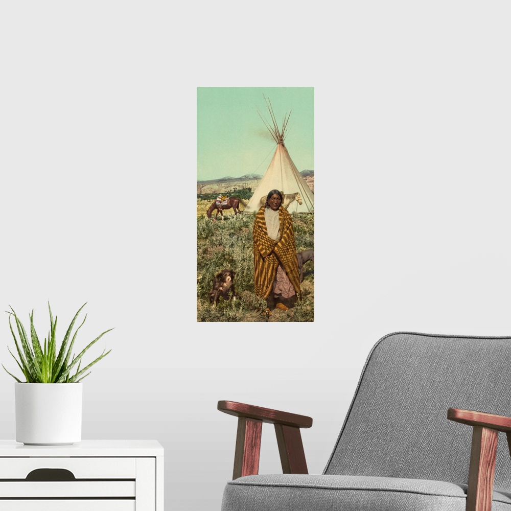 A modern room featuring Hand colored photograph of a crow native American.
