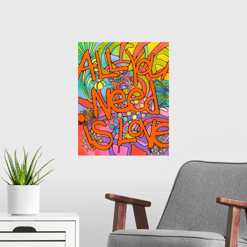 A modern room featuring "All You Need is Love" Written in orange bubble letters with paint drips on top of a colorful bac...