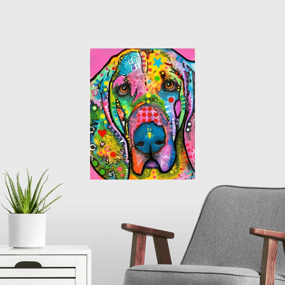 A modern room featuring Colorful painting of a Bloodhound with abstract markings all over on a bright pink background.