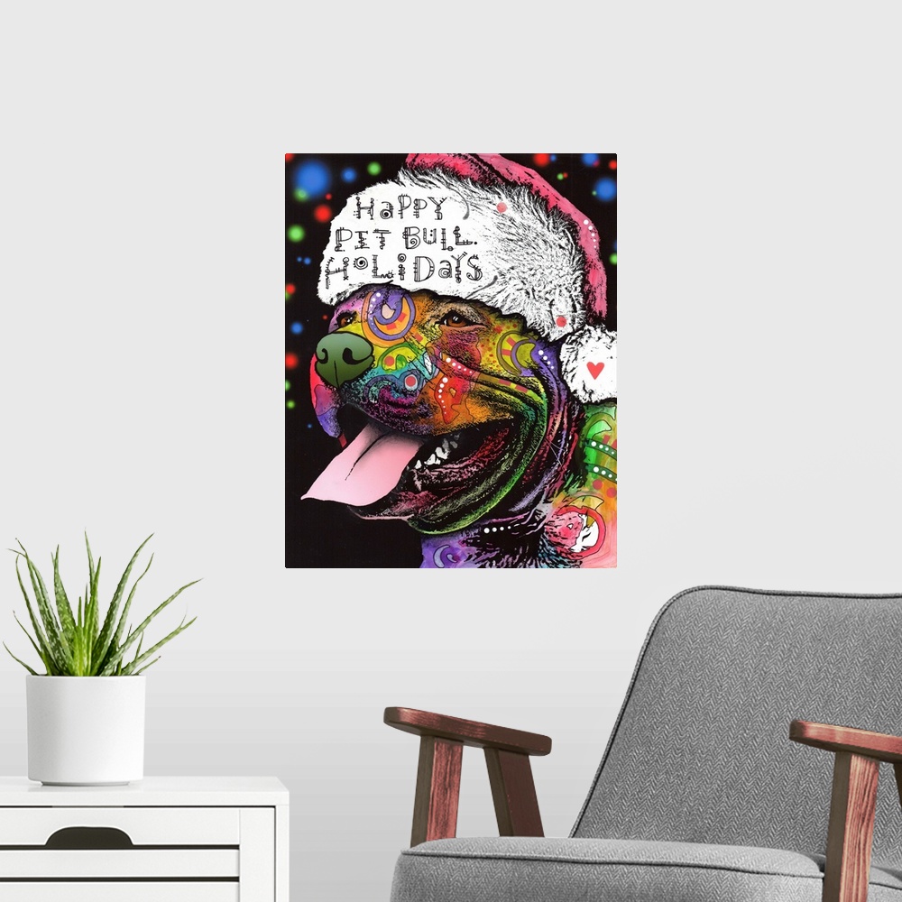A modern room featuring "Happy Pit Bull Holidays" handwritten on a Santa hat that a happy pit bull covered in different c...