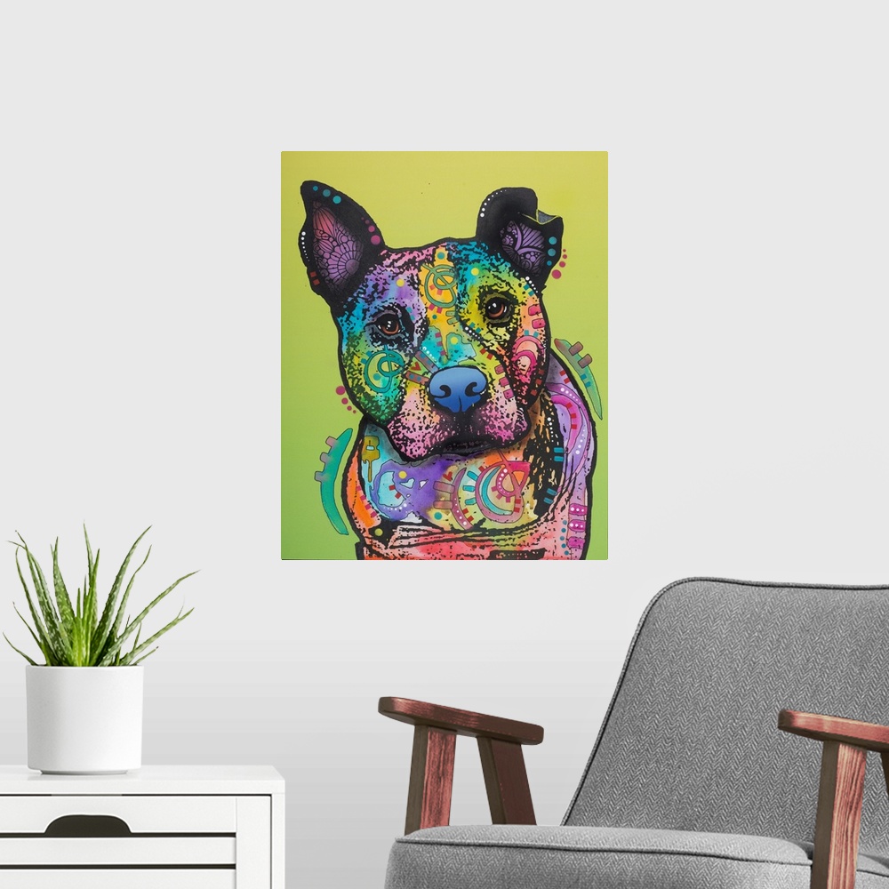 A modern room featuring Colorful painting of a pit bull covered in shaped designs on a yellow-green background.