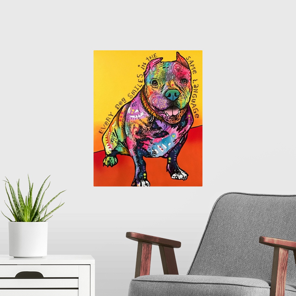 A modern room featuring "Every Dog Smiles in the Same Language" handwritten around a colorfully painted pit bull on a yel...