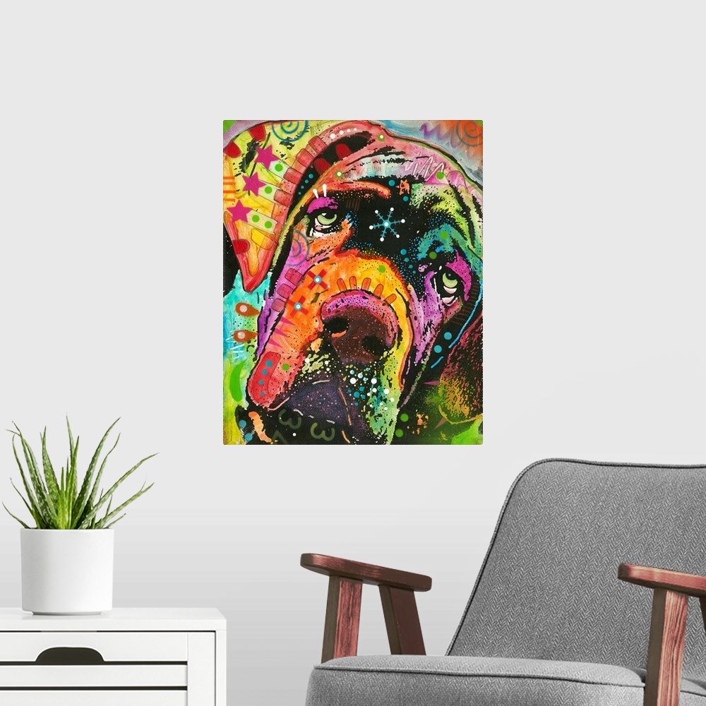 A modern room featuring Vibrant painting of droopy faced dog with colorful abstract designs all over.