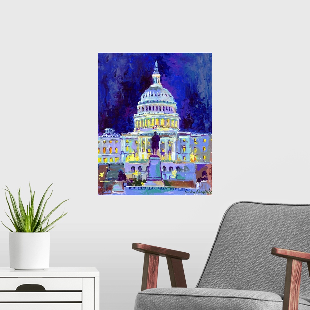 A modern room featuring Painting of the nations capitol building lit up at night.