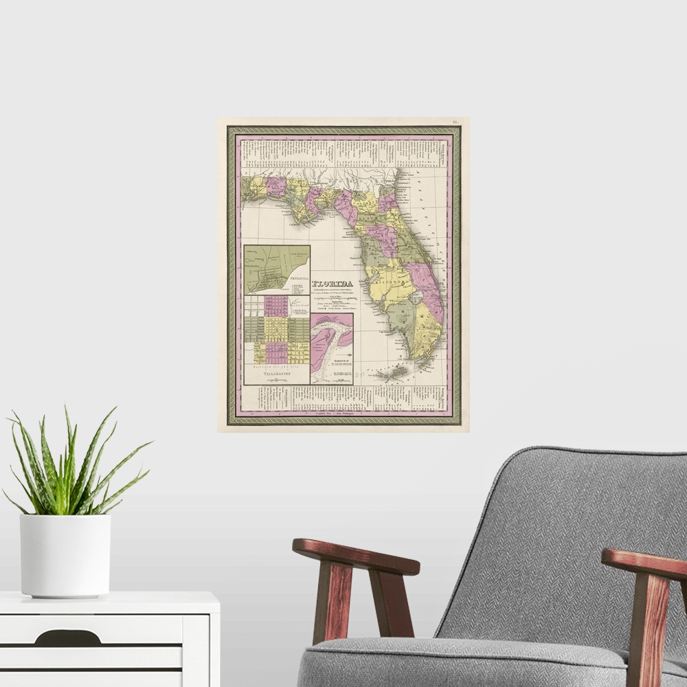 A modern room featuring This large piece is an antique map of the state of Florida.