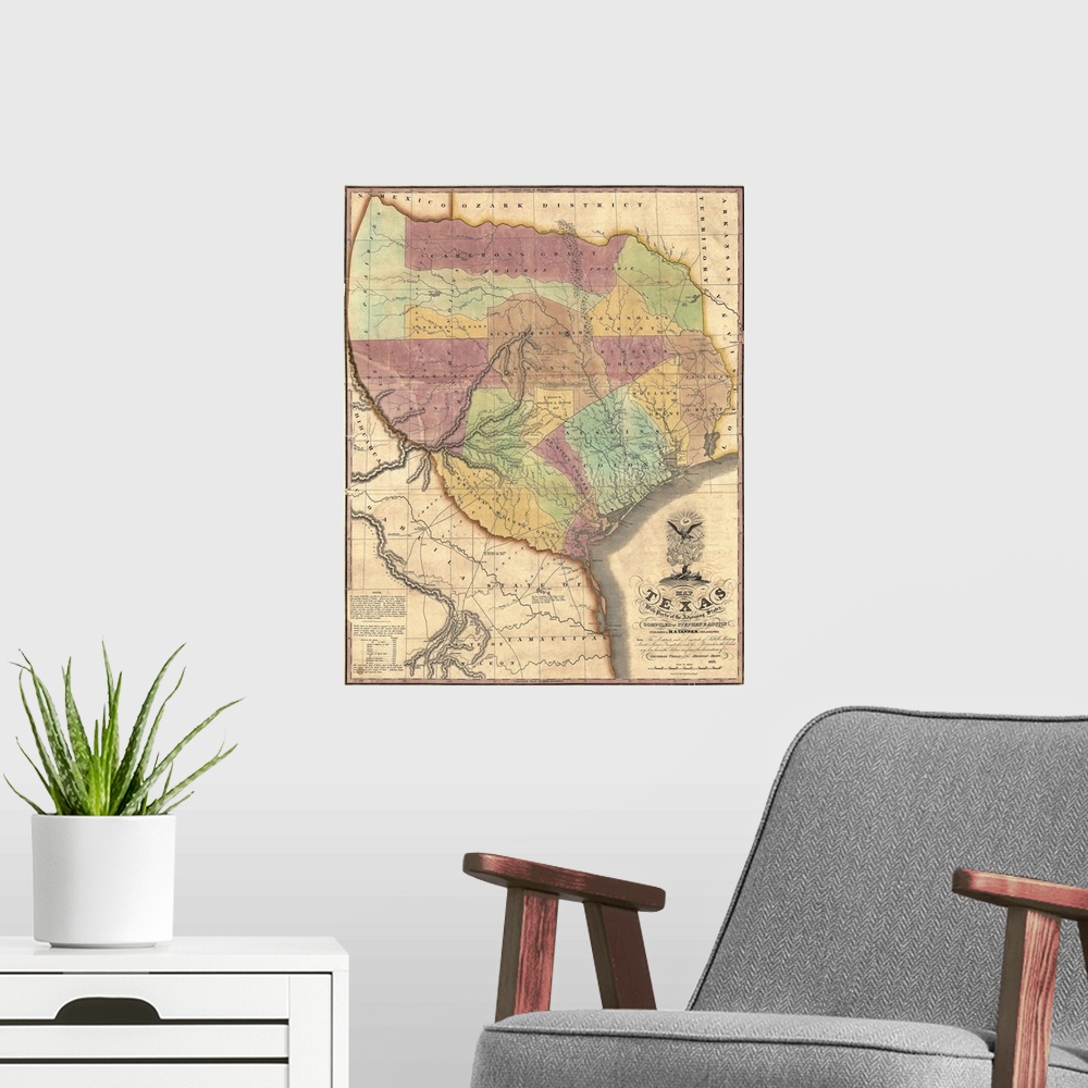 A modern room featuring This is a very old antique map of the Lone Star state in its very early history showing different...