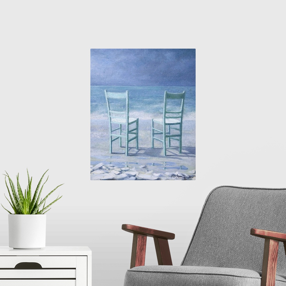 A modern room featuring Contemporary painting of two table chairs sitting on a beach facing the sea.