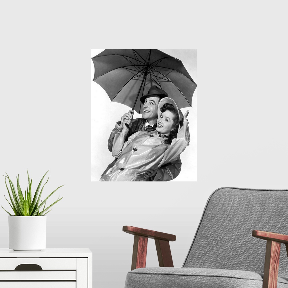A modern room featuring Chantons sous la pluie Singing in the rain avec Gene Kelly et Debbie Reynolds 1952