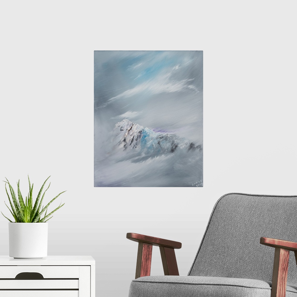 A modern room featuring Contemporary painting of a mountain peak shrouded in snow and clouds.