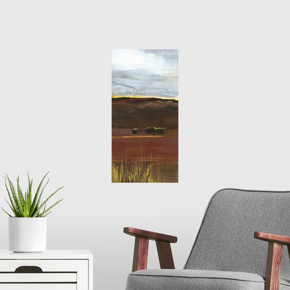A modern room featuring A long vertical painting of an abstract landscape of a prairie field in textured earth tones.