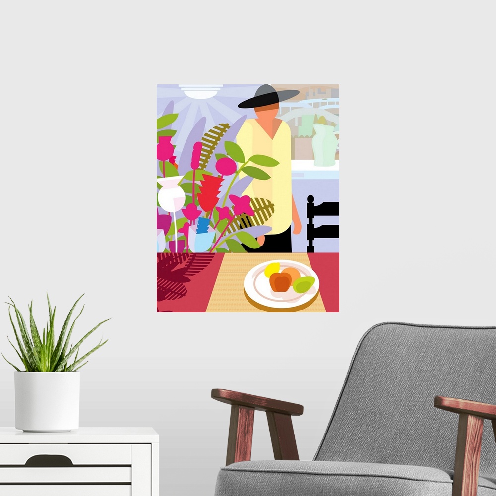 A modern room featuring Bright dining room with flowers and a plate of fruit
