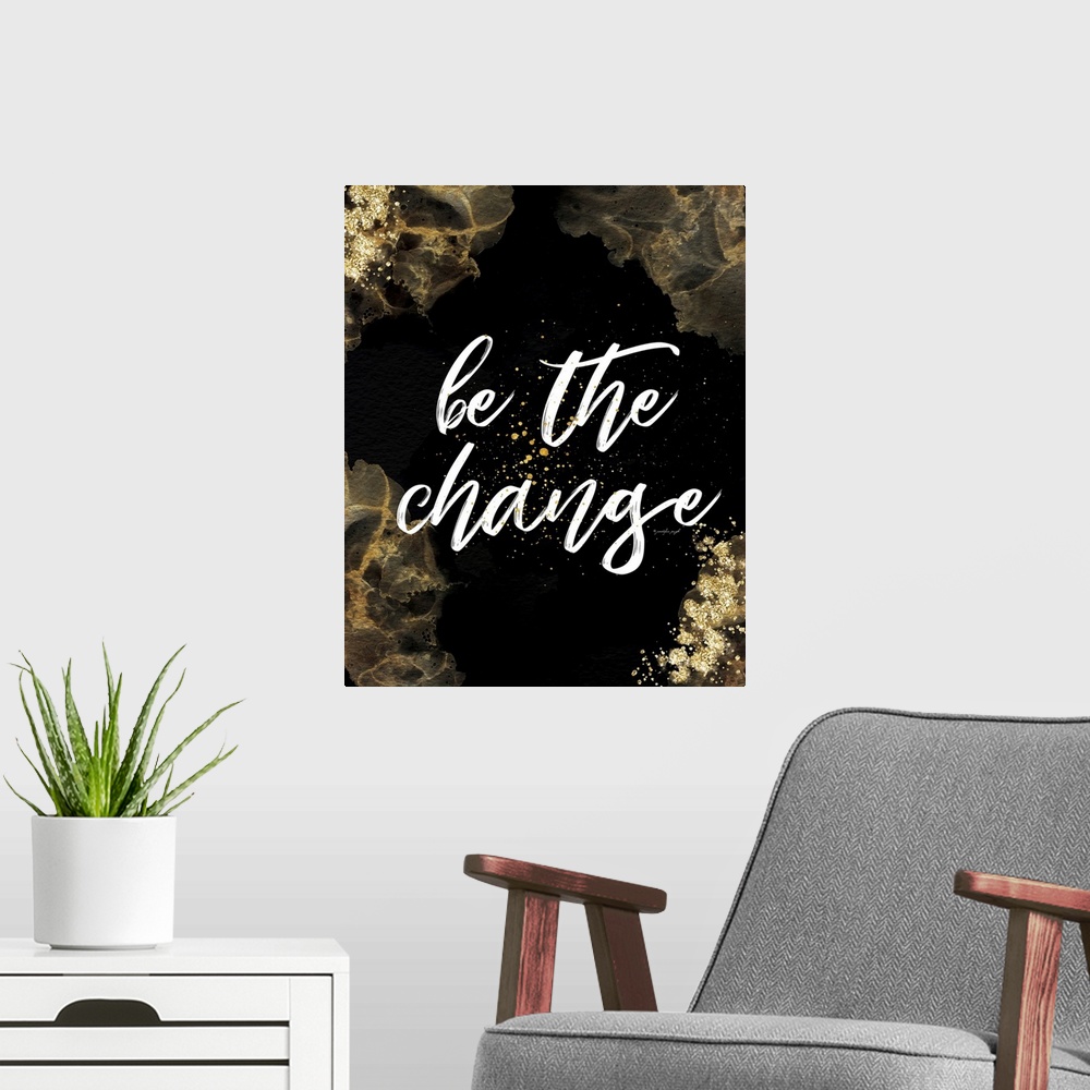 A modern room featuring Be the Change