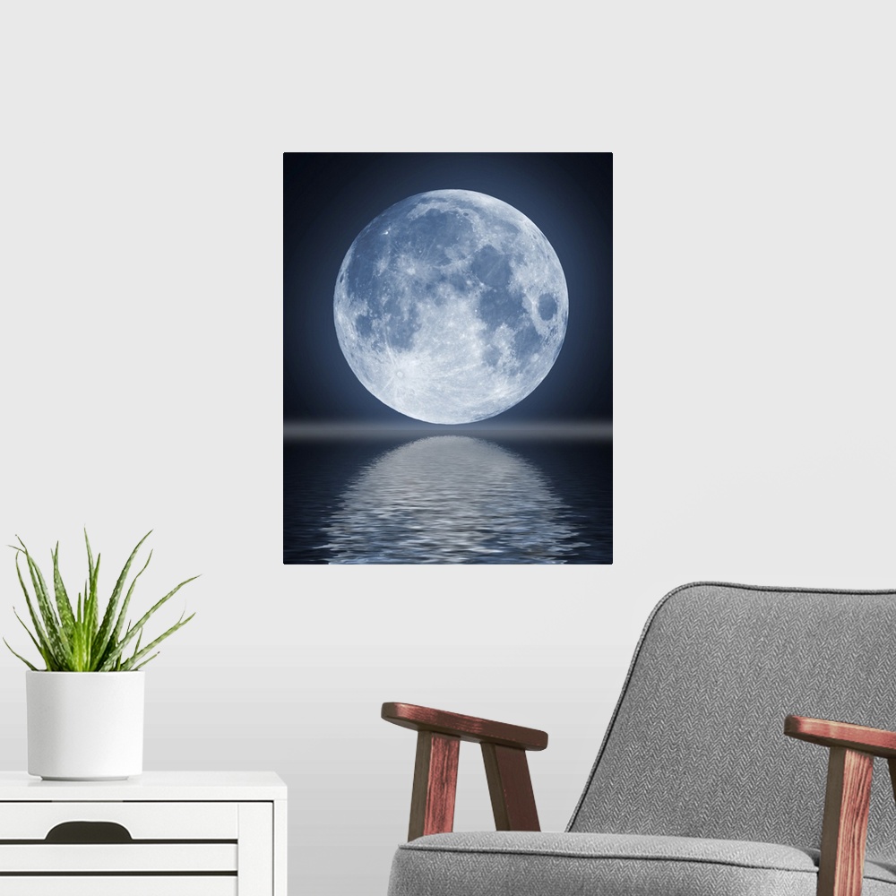 A modern room featuring The full moon in the night sky reflected in water.