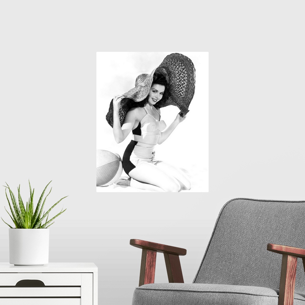 A modern room featuring Black and white photograph of Ann Miller.